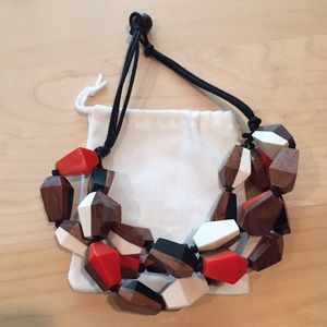Multi-colored three strand wooden necklace